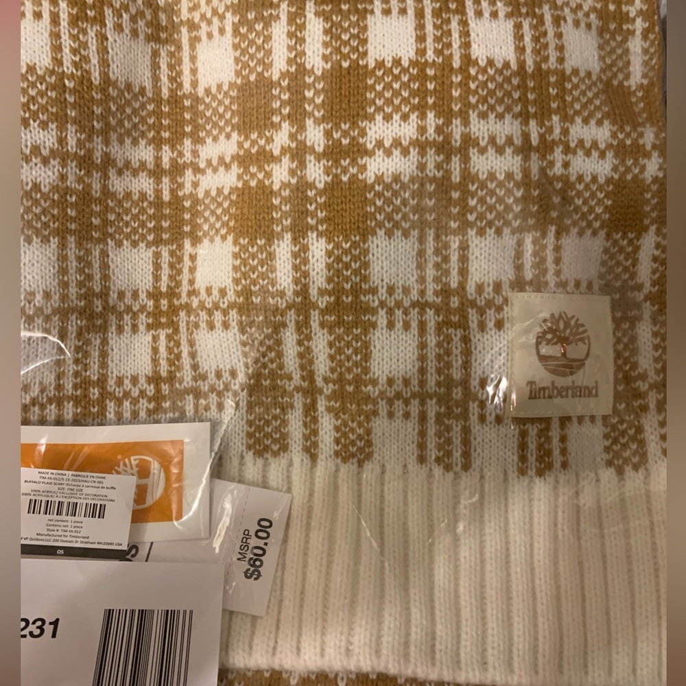 Brand new in the packaging Timberland scarf. Tan and white in color